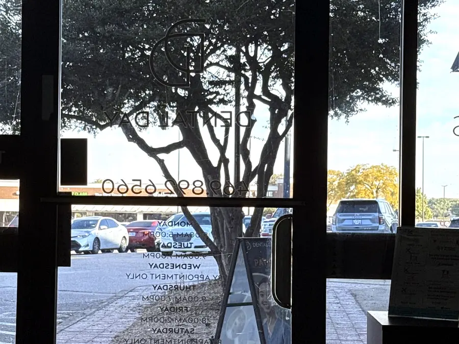 The Dental Day building and parking area in Carrollton